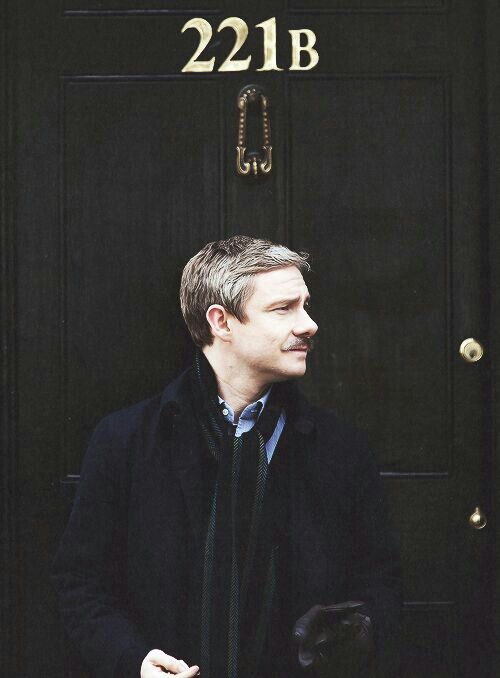 Dr.JohnWatson infront of his appartment 221B  